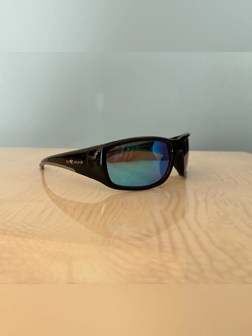 Piranha Men's Black Sunglasses with Blue Mirrored Lenses